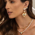 Arete corazón perla