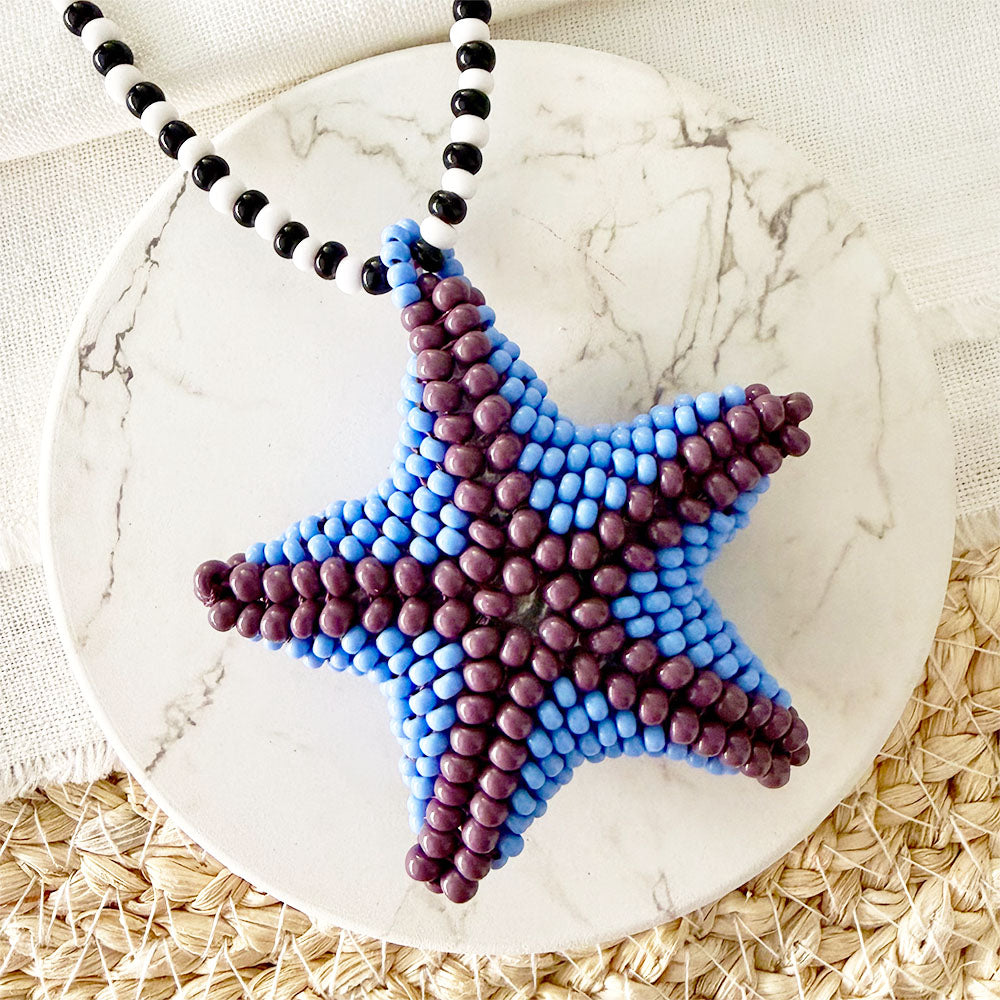 Collar estrella morada